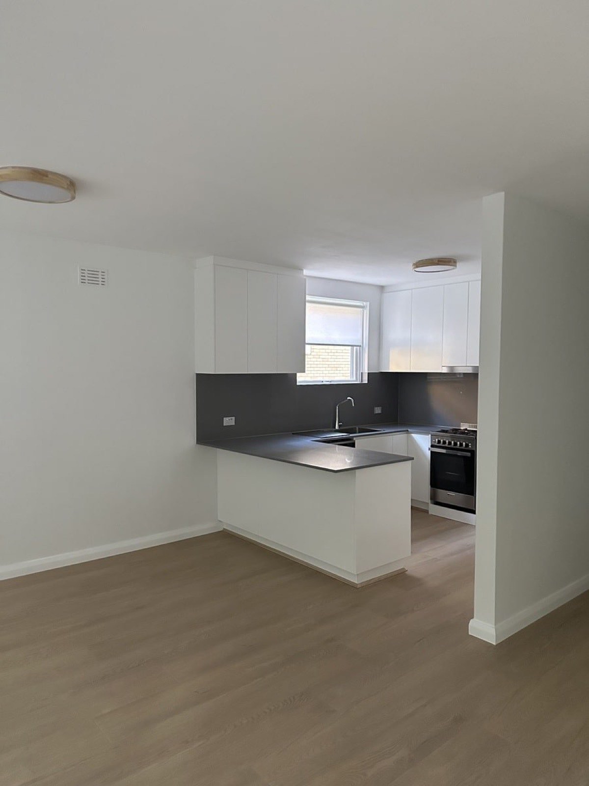 Apartment kitchen renovation with new ceiling lights, power points and appliance wiring