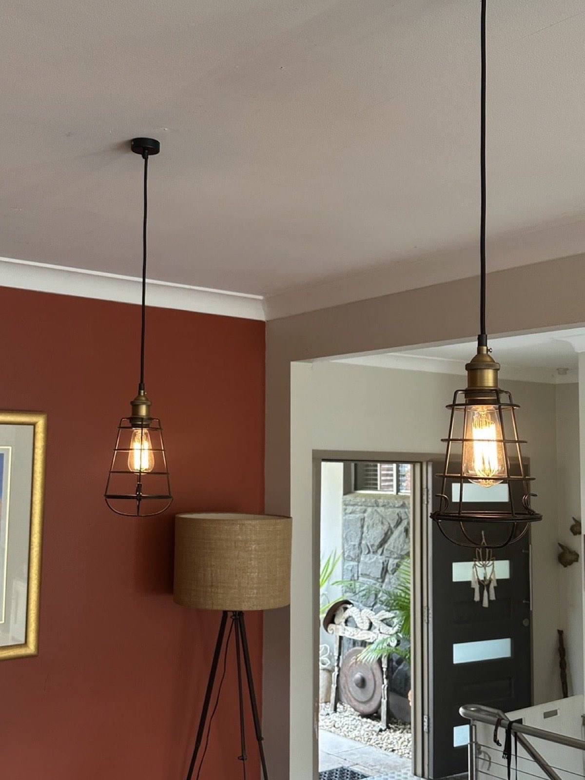 Pair of pendant lights installed in a dining area