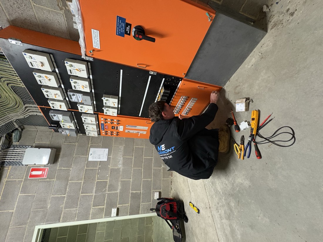 Marmont Electrical working on an apartment building main switchboard