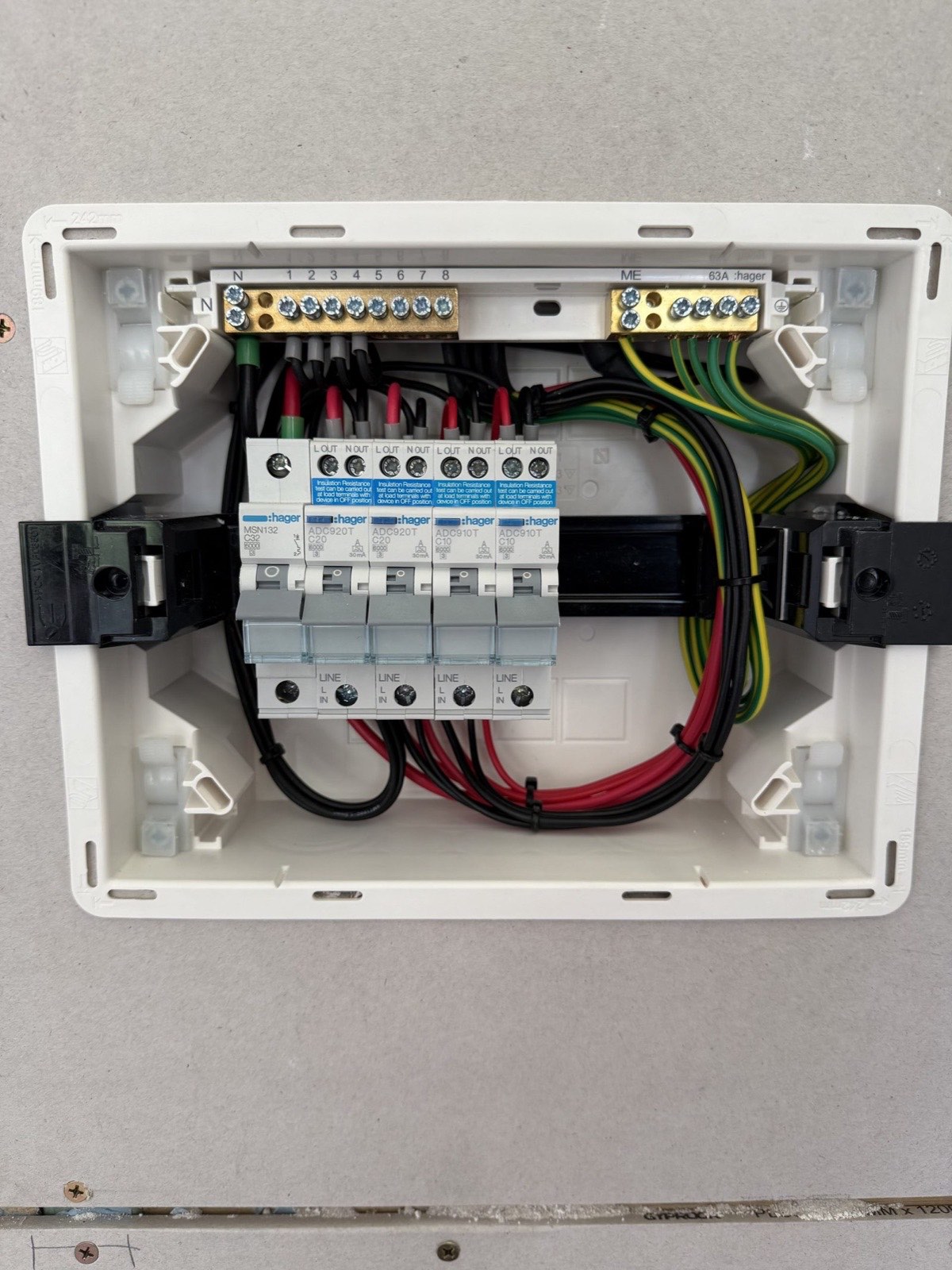 Close-up of a new switchboard with RCBO circuit breakers and neat wiring